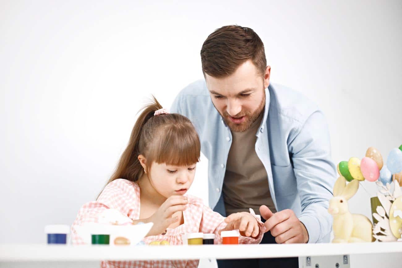 Parent supporting their child with learning disorders